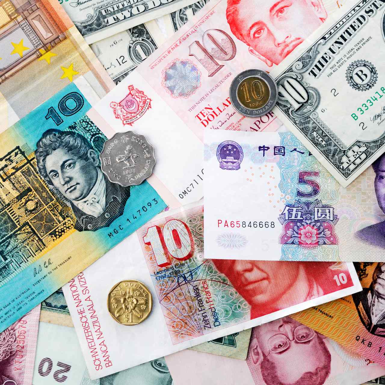 Bank Notes And Coins In Various Currencies